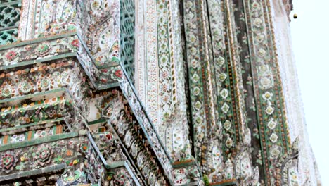 close-up views of wat arun's ornate architecture