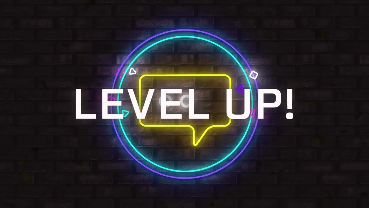 Digital animation of level up text over neon yellow message icon on round banner against brick wall