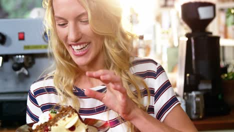 Woman-holding-a-plate-of-desserts