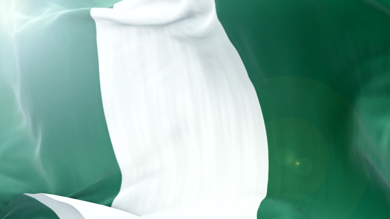 bandera de nigeria fondo de agitaciones lentas. 4k agitaciones de banderas de primer plano. bucle sin costuras