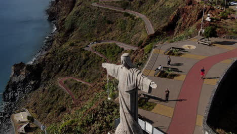 exploring the majesty of cristo rei statue in funchal: aerial video on madeira island