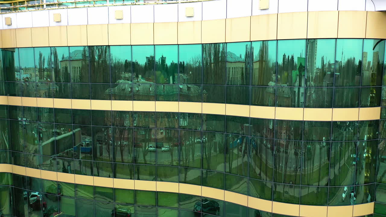 Modern office building detail. Bottom view of modern skyscrapers in business district against city