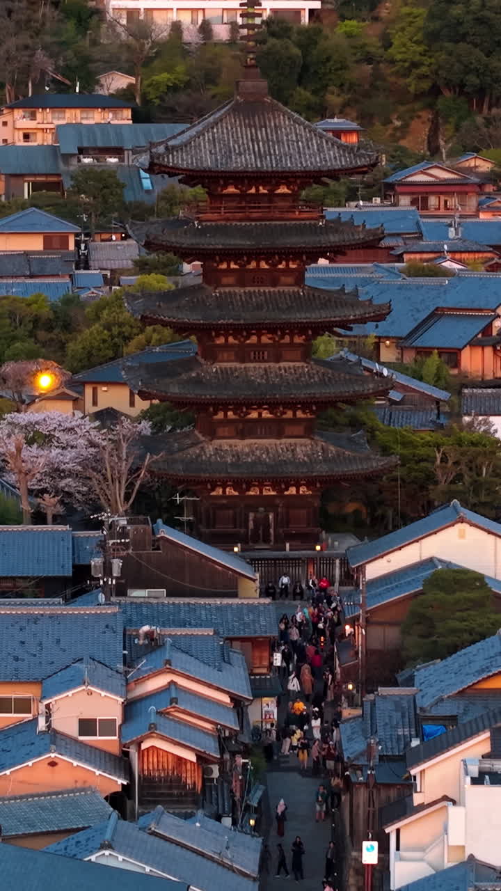 Aerial drone view of the Yasaka Shrine at sunset in Kyoto, Japan