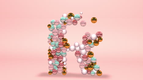 Letter-R-made-of-beads,-glass-balls,-pastel-pearls,-crystal-jewels-and-gold