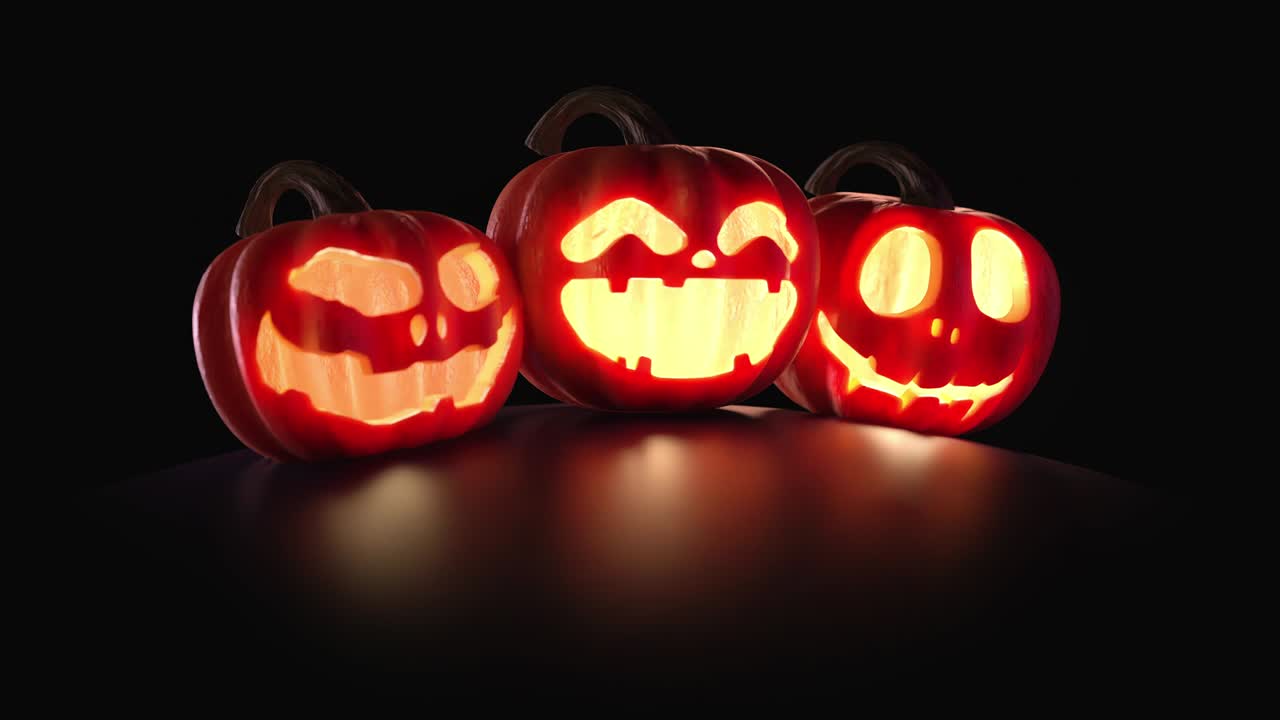 las calabazas de halloween están ardiendo, brillando sobre un fondo negro oscuro