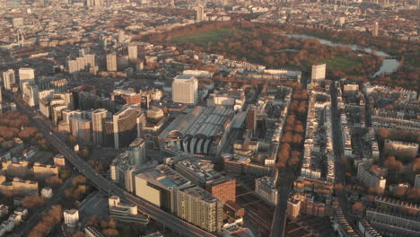 Circling-aerial-shot-over-Paddington-station-West-London-at-sunset