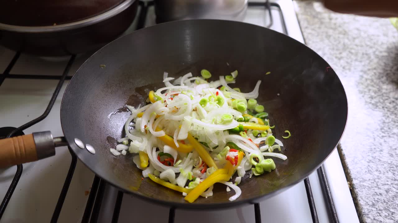 Cooking Delicious Mixed Vegetables Recipe In A Wok At The Kitchen