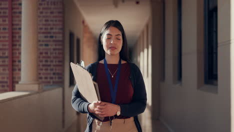 School,-time-and-teacher-walking-in-hallway