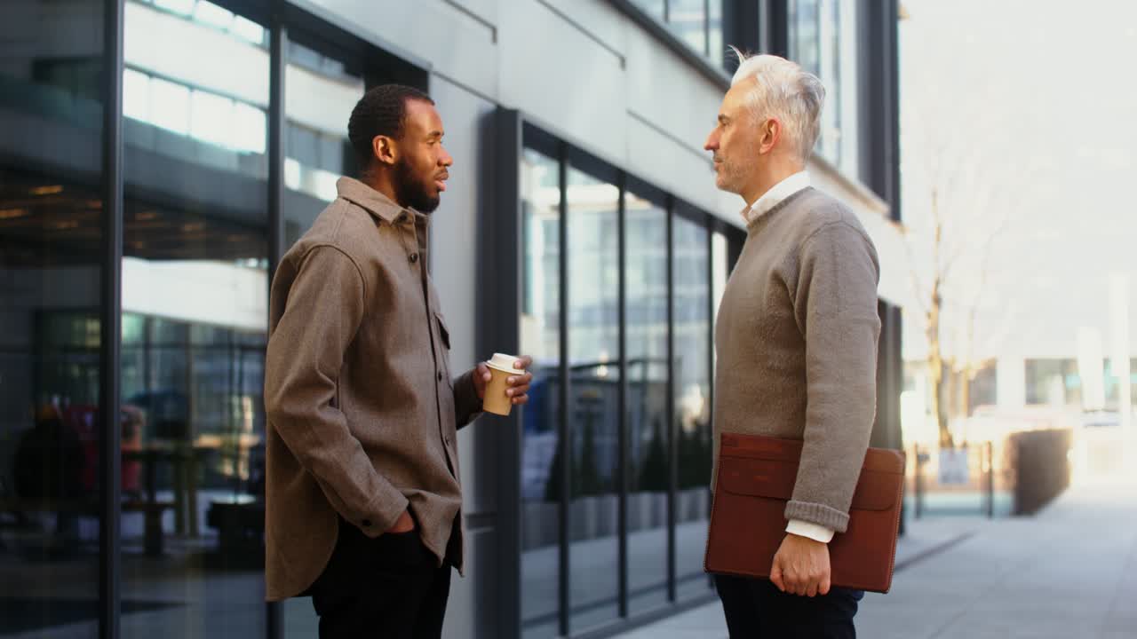 Two Men in Conversation