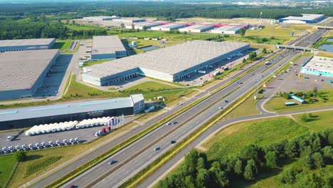 aerial view of warehouse storages or industrial factory or logistics center from above