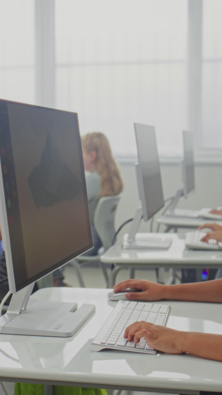 Primary School Students Painting Pictures on Computers Teacher Educating Kids Using Digital Screen