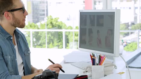 Handsome-businessman-working-concentrated-