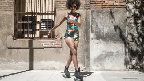 cool roller skating woman dances and skates outside in an urban setting