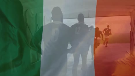 animation of irish flag waving over a multi-ethnic male rugby team running to the pitch