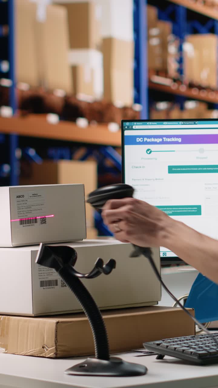 Vertical Video Asian male worker scanning shipment labels and tracking numbers