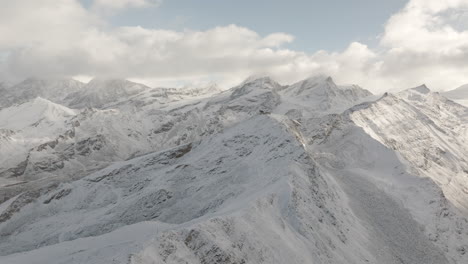 first fresh snowfall dusting morning matterhorn landscape scenery zermatt glacier peak aerial drone ski resort autumn swiss alps summit chairlift gornergrat railway switzerland right circle motion