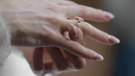 elegant blonde bride wear beautiful engagement ring. woman at wedding morning