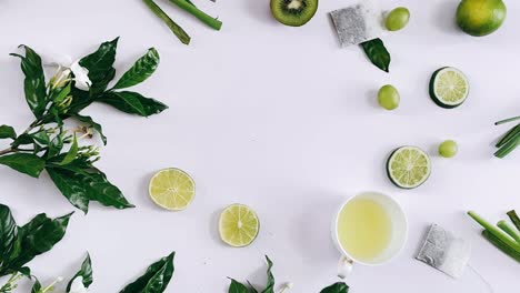 green tea, fruits & flowers arrangement