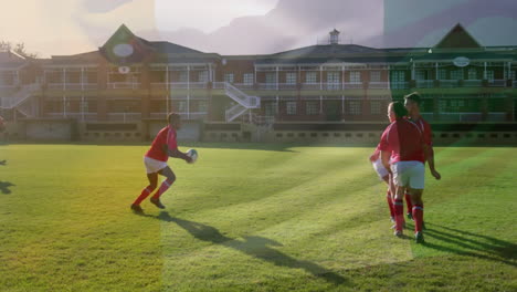 animation of flag of ivory coast over diverse male rugby players