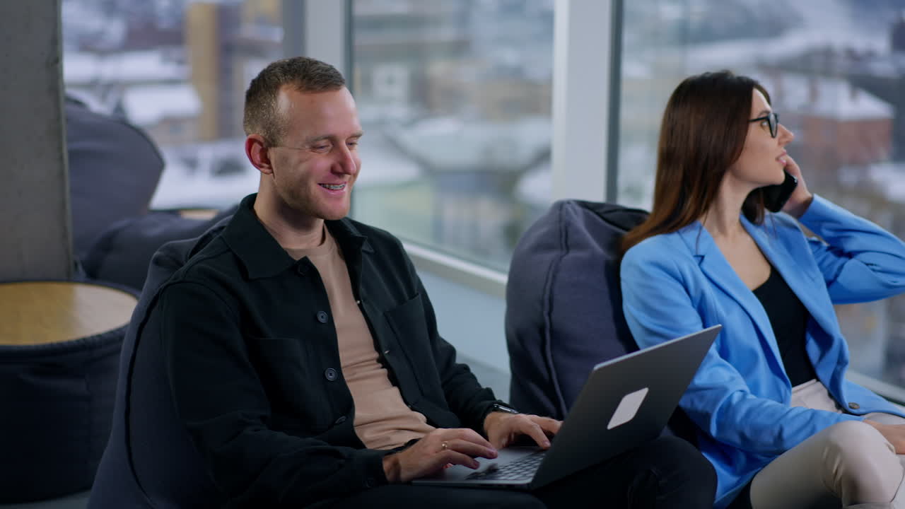 Business Colleagues Working in Modern Office Space