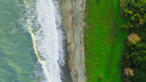 rough ocean in puglia with beach nature background overhead vertical relaxing