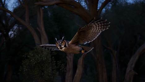 eagle owl in flight at night