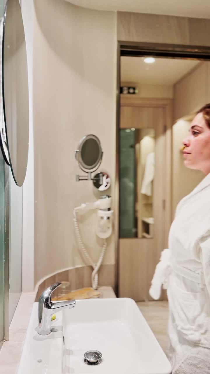 Woman Preparing Analgesic Medication in Bathroom