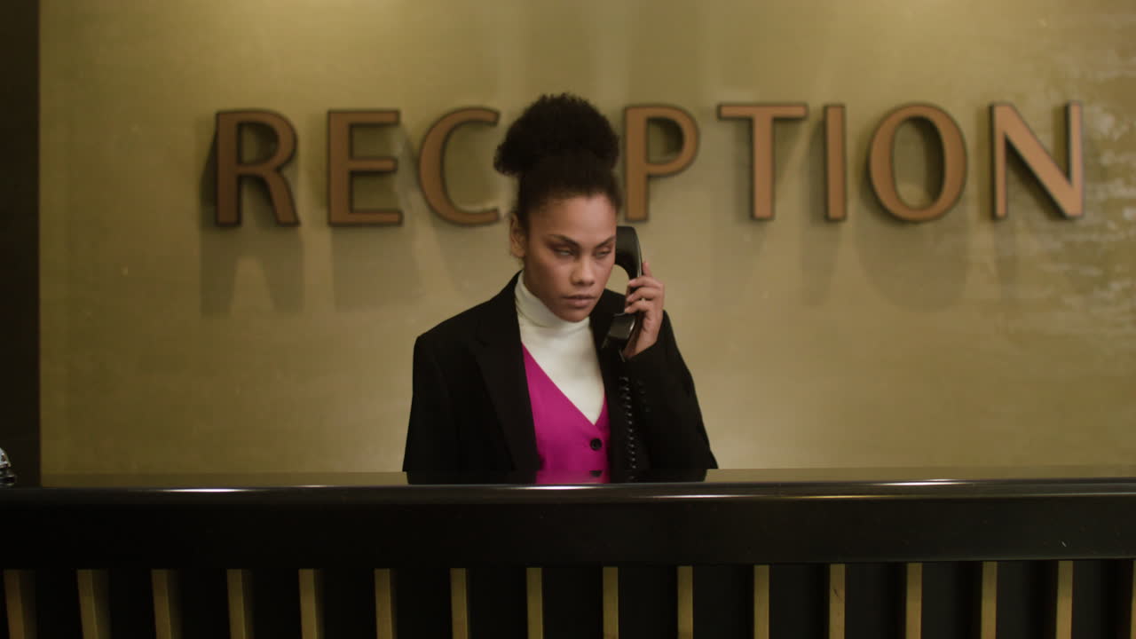 Receptionist answering a phone call