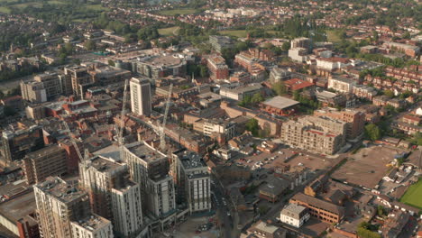 Circling-aerial-shot-of-new-building-development-in-Maidenhead-town