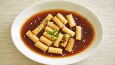 spicy jjajang tteokbokki or korean rice cake in spicy black bean sauce - korean food style