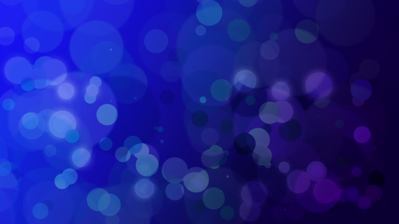 volar grandes partículas azules y redondo bokeh en el fondo oscuro