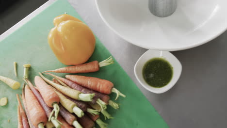 view of meal ingredients lying on counter in kitchen, slow motion