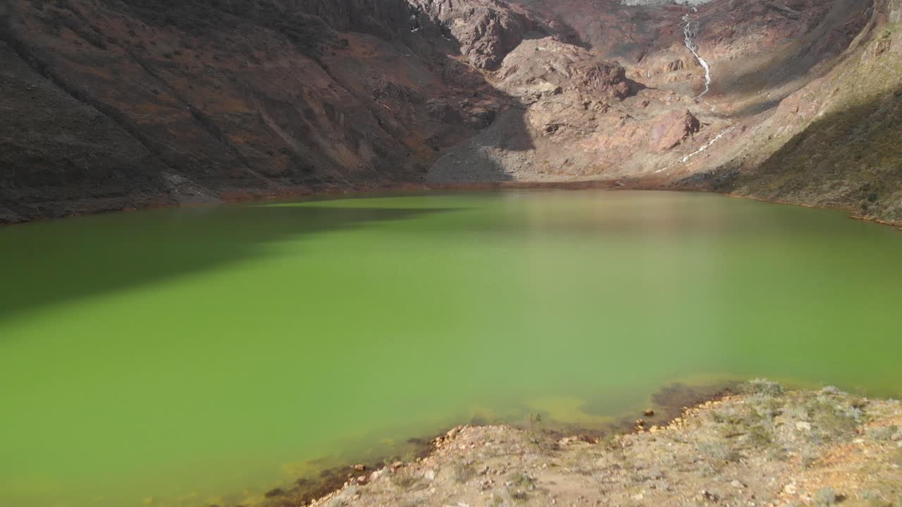 fly over the green lake smooth and tilt