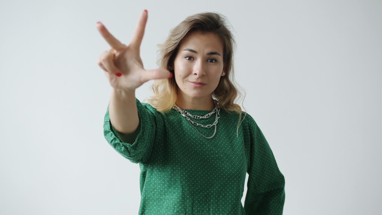 Woman Pointing with Hand