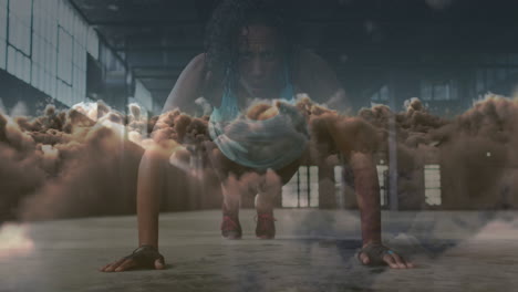 animation of clouds over african american sportswoman doing push ups