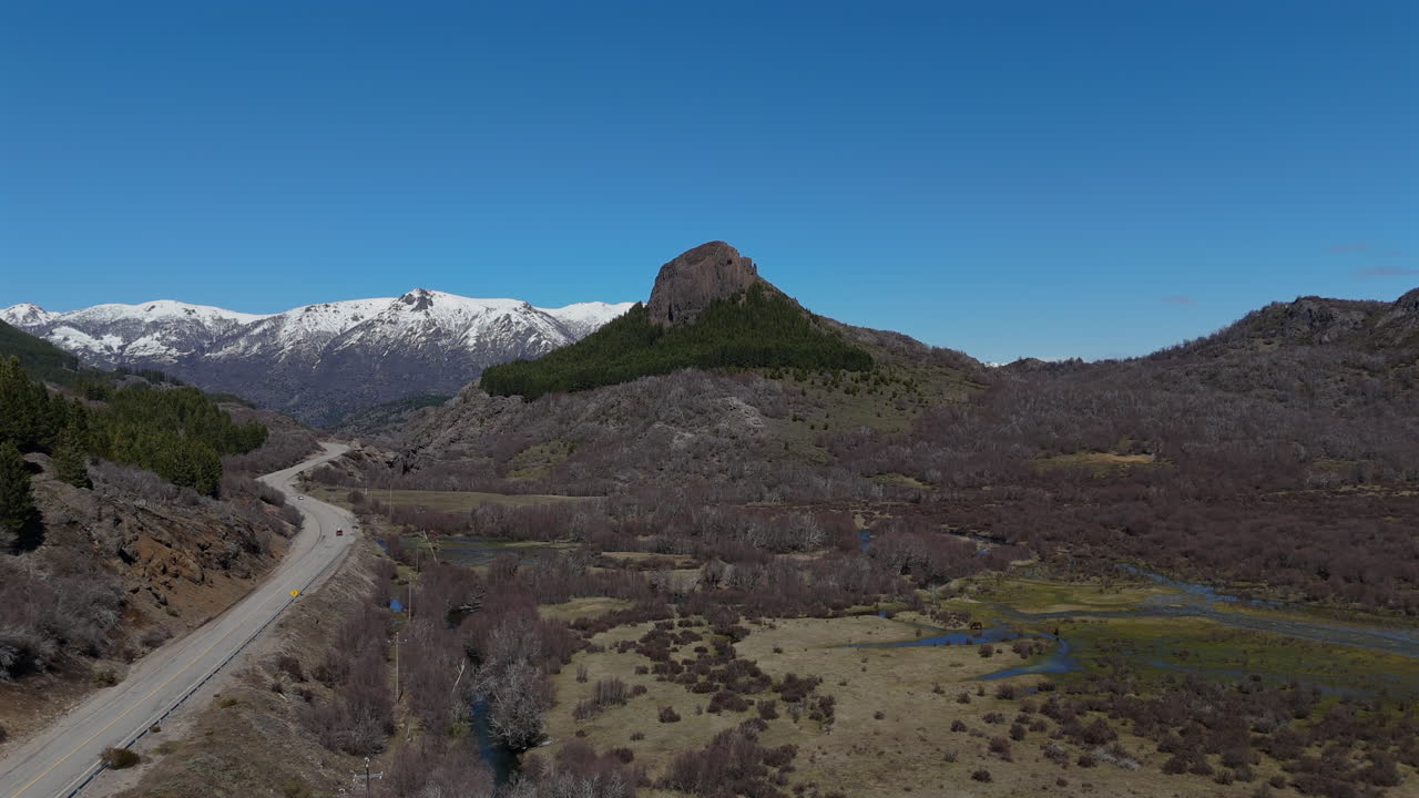 Stunning Aerial View of Patagonian Landscape with a Mountain Road