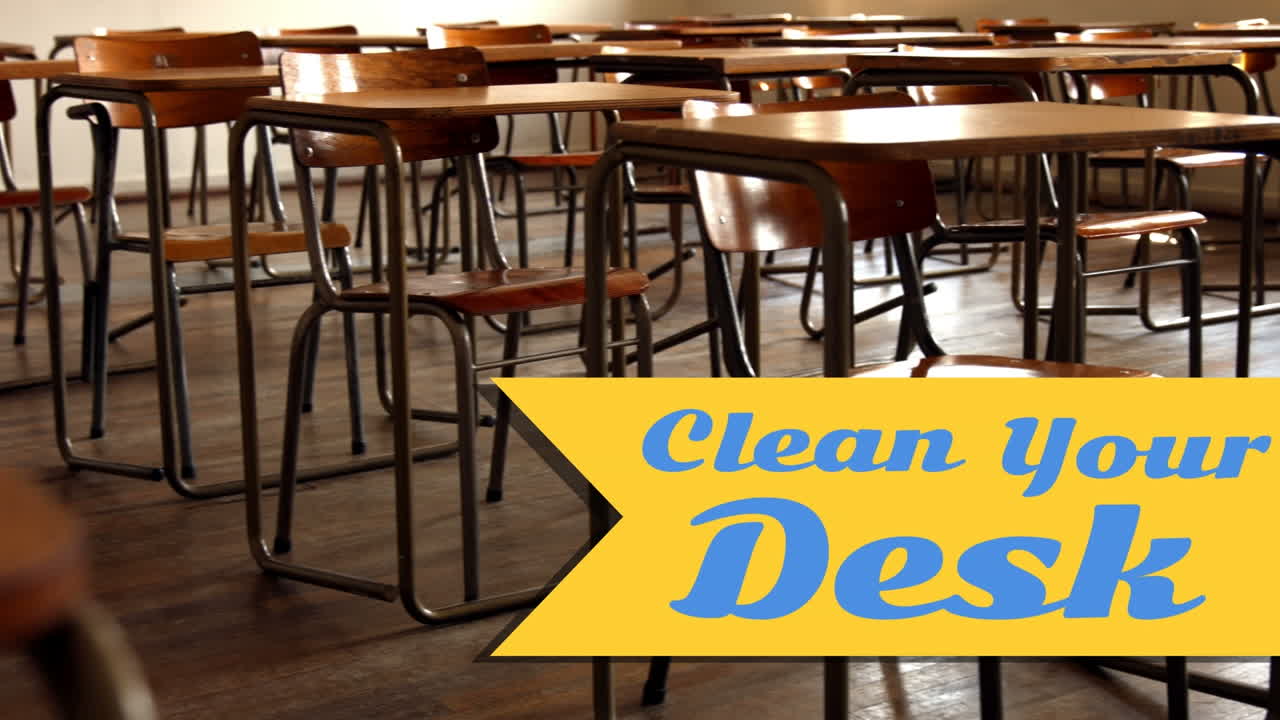 Animation of clean your desk text over empty classroom