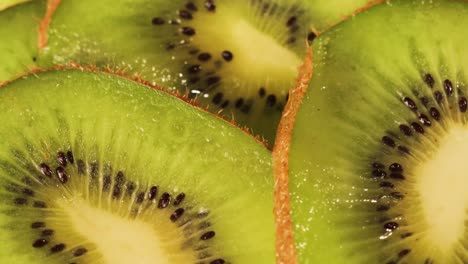 rotating detail shot of kiwi slices