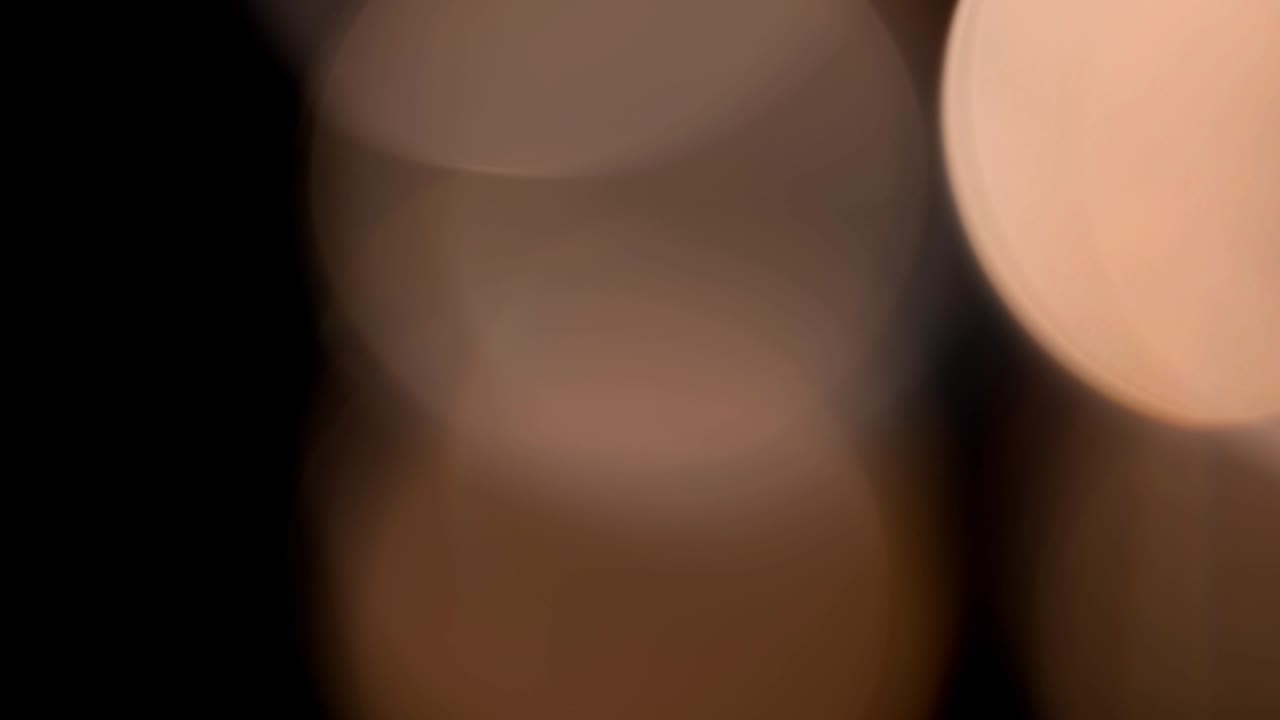 Multicolored light leaks footage on black background, lens flare leak burst overlays transitions