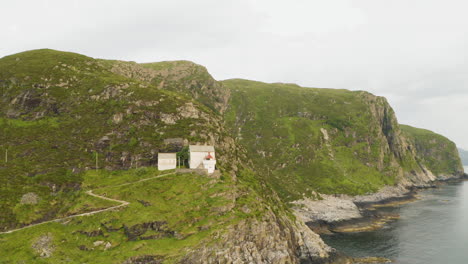 hendanes lighthouse on the western shore of the island of vagsoy in norway