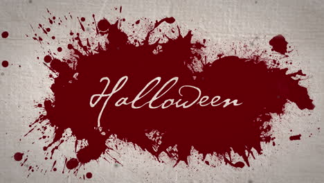animación del texto de halloween sobre la mancha de sangre en un fondo beige