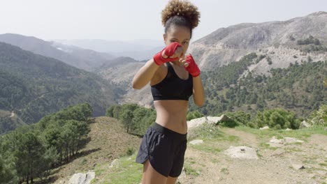 young girl posing as boxer