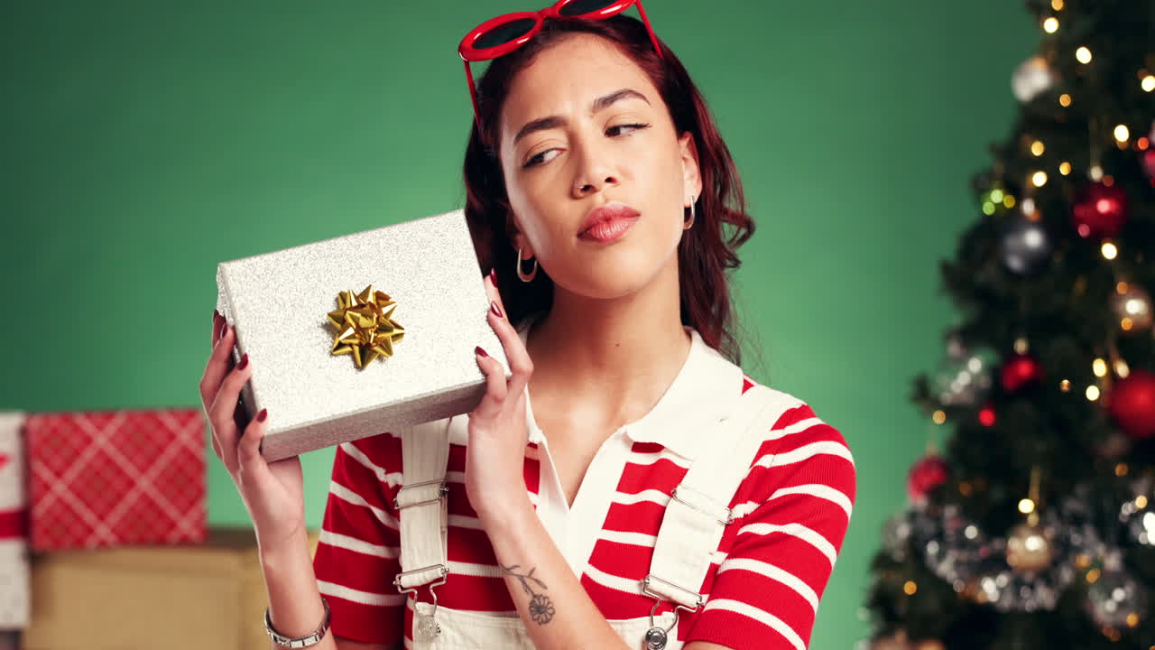 A woman celebrates Christmas with presents