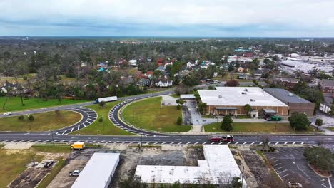 truck driving on highway 221 in city of valdosta, lowndes county, georgia, usa. aerial panning shot