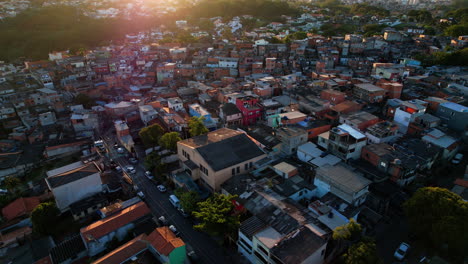 Flying-over-poor-architecture-at-a-slum-area,-sunny-evening-in-Brazil---aerial-view