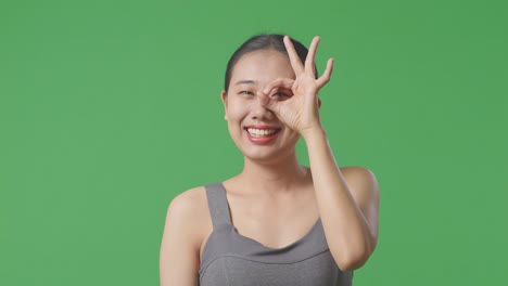 woman making ok gesture