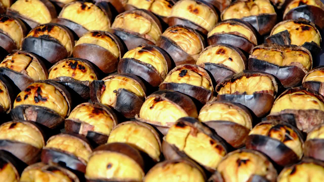 Close up of fresh, hot, grilled chestnuts. Roasted Chestnuts. Traditional street food of Istanbul.