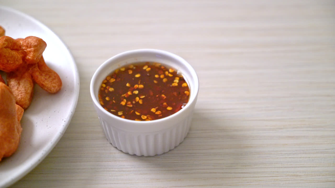 deep fried sausage with dipping sauce