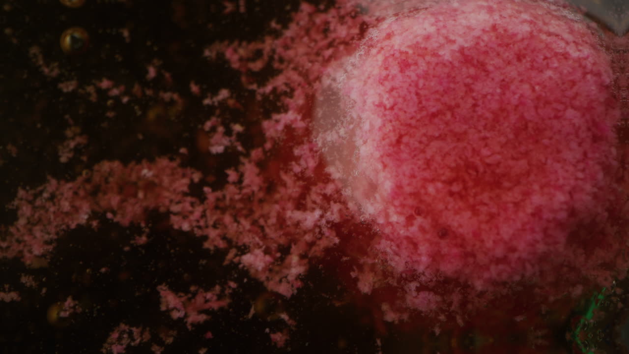 Pink spheres in liquid