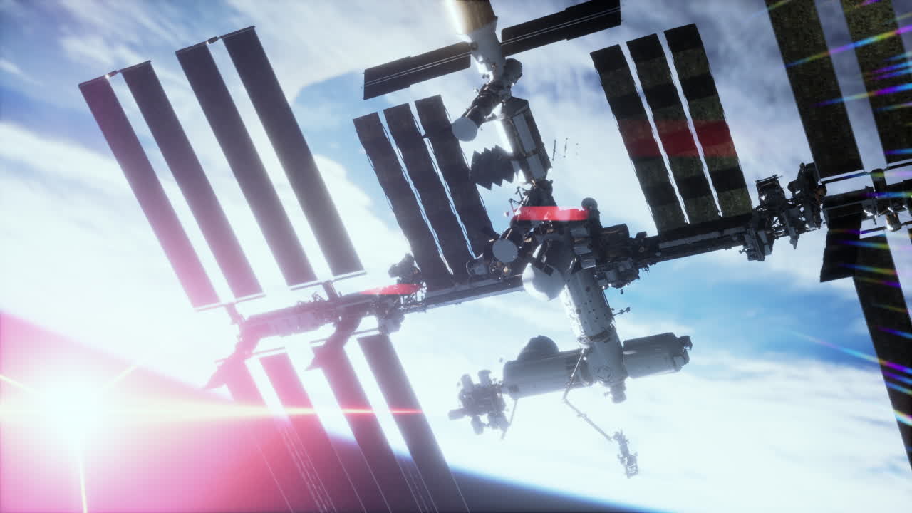 지구와 국제 우주 정거장이 지구 주위를 공전하고 있습니다.